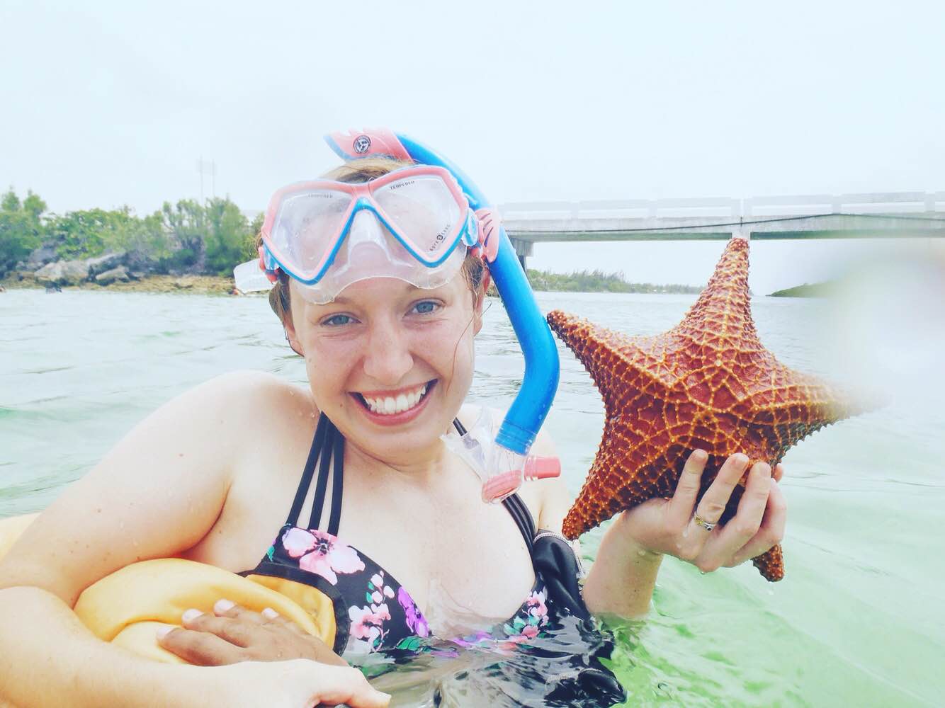 Student holding starfish