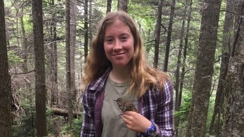 Olivia Merritt Holding a Bird - My Experience in the Climatepedia Program - College of Natural Resources at NC State University