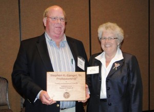 Steve Conger and Mary Watzin with Conger Professorship Plaque
